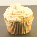 Pumpkin Muffin with Frosting on table