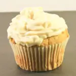 Pumpkin Muffin with Frosting on table