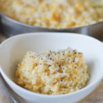 Butternut Squash Risotto in white serving bowl on cutting board