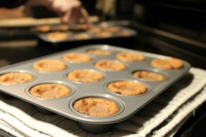 Freshly baked cookie cups in mini muffin tin