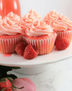 cake stand with cupcakes and strawberries