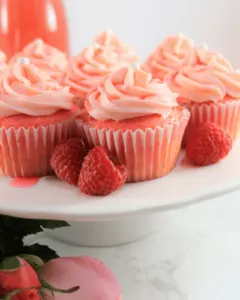 cake stand with cupcakes and strawberries