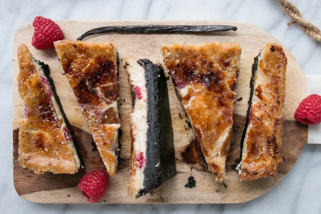 slices of creme brule bars on wooden cutting board 