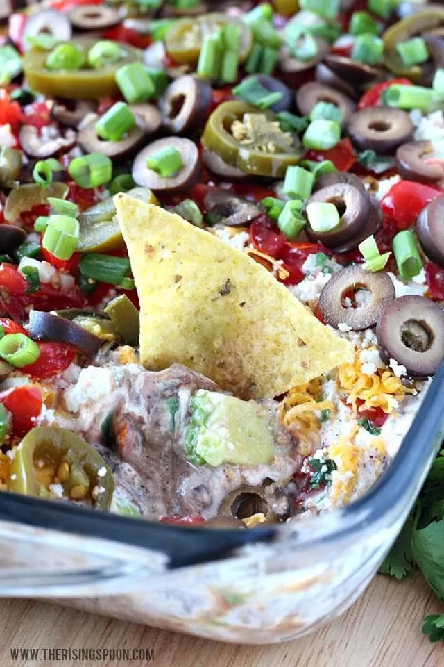 Layered Black Bean dip in rectangle dish