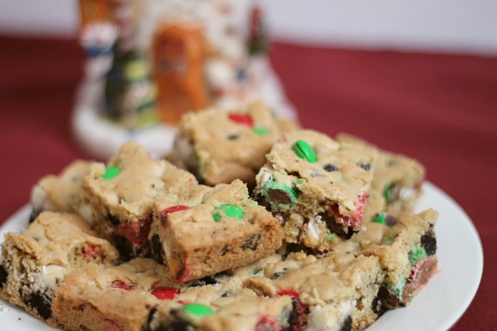 Cookie Bars with M&Ms on Christmas Plate.