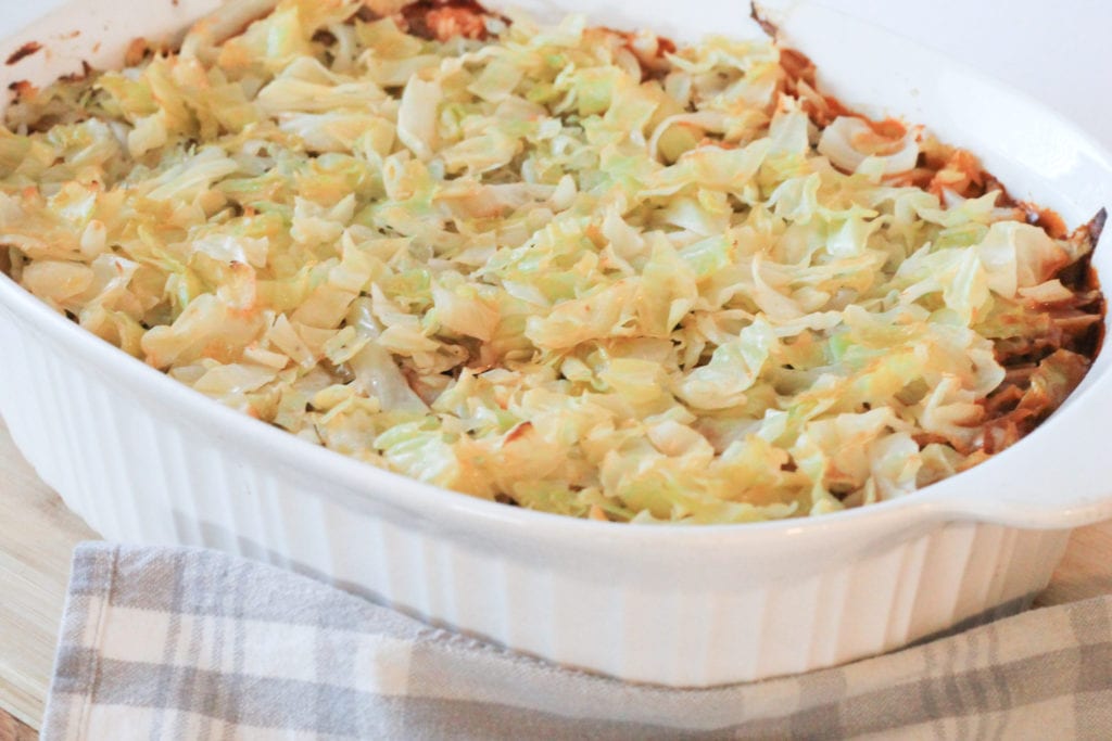 Cooked Cabbage Roll Casserole in white casserole dish 
