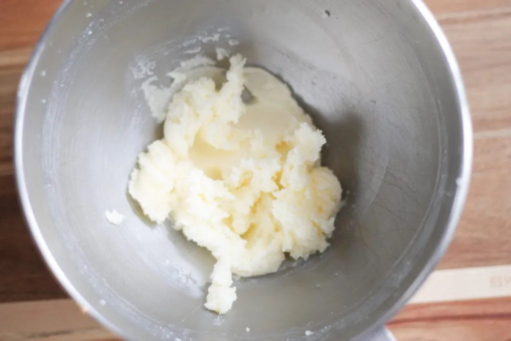 Creamed butter and sugar in Kitchen Aid mixer bowl 