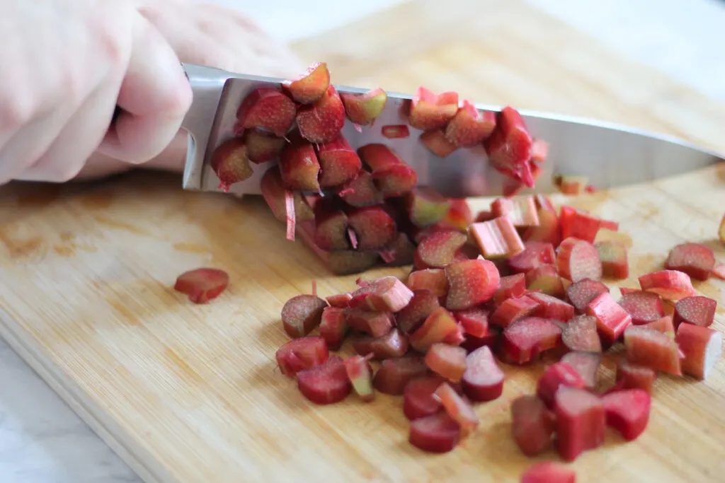 Cutting board with chopped rhubarb.