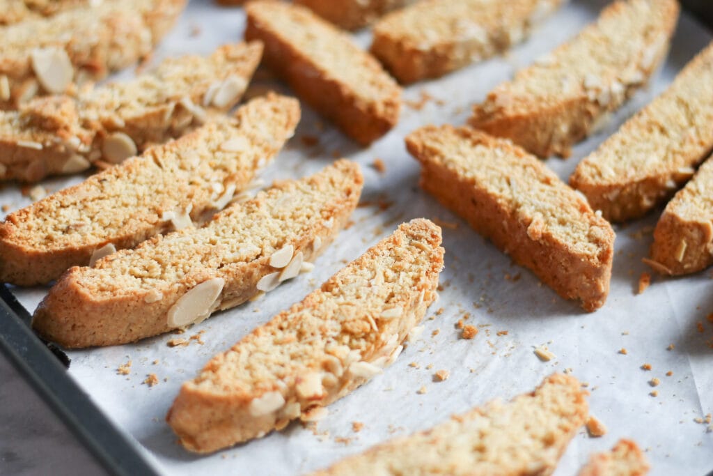 Finished crunchy biscotti cookies on baking sheet.