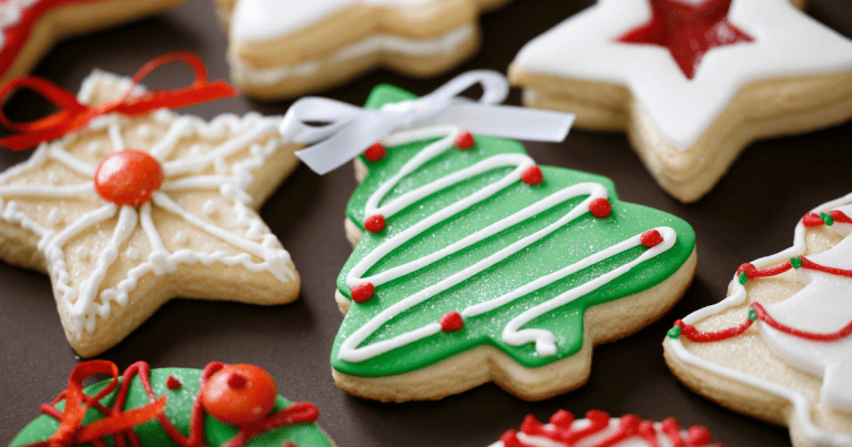Variety of Christmas cookies on countertop.